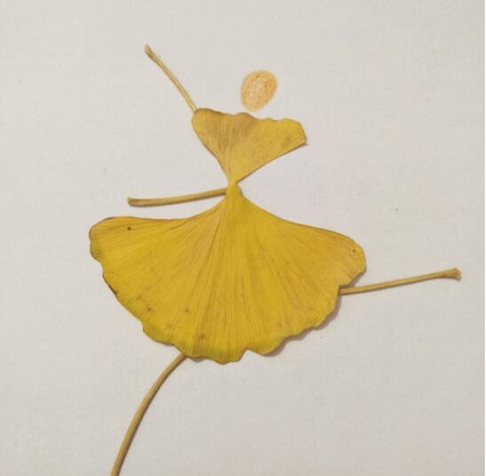 用银杏叶做跳舞的人 儿童树叶贴画
